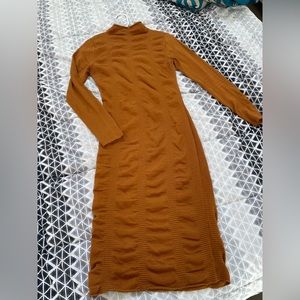 Beautiful Brown Dress . Fits really nice for curvy women . Wore twice